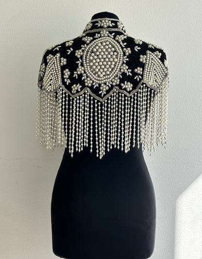 AVASA Black Pearl Beaded Fringe Capelet back view with pearl fringe and black base