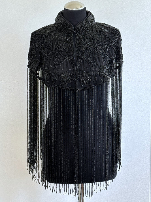 AVASA Black Floral Beaded Long Fringe Capelet front view