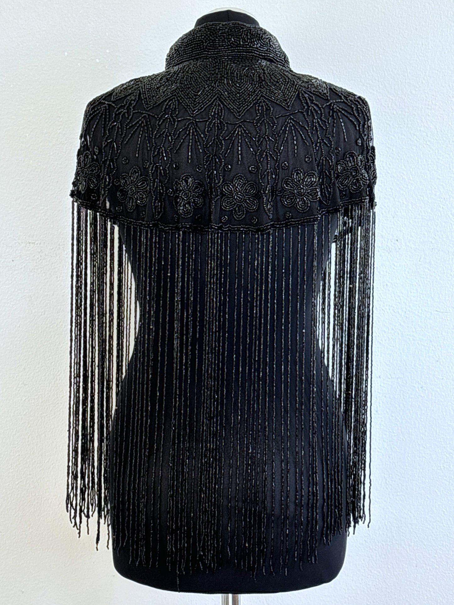 AVASA Black Floral Beaded Long Fringe Capelet back view