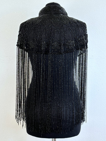 AVASA Black Floral Beaded Long Fringe Capelet back view